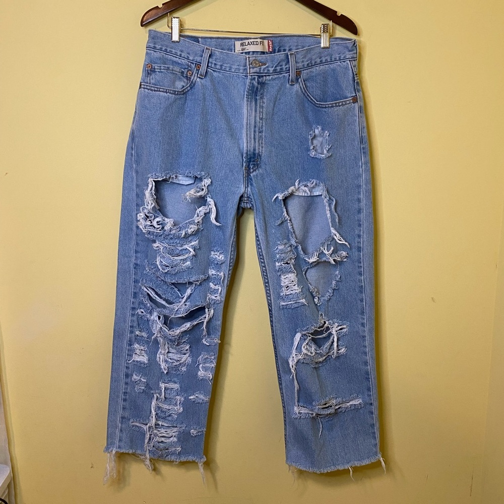Levi’s Relaxed Fit Heavily Distressed Raw Hem 550 Jeans